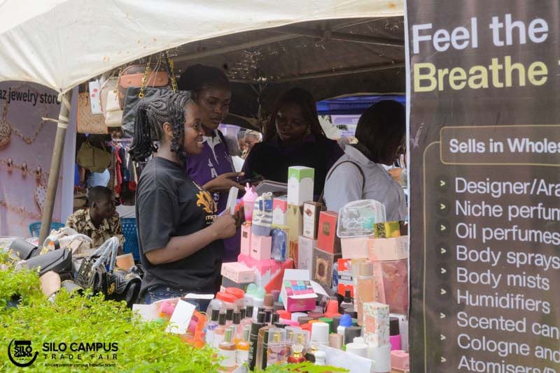 Exhibitors setting up a stall at a Silo tradefair